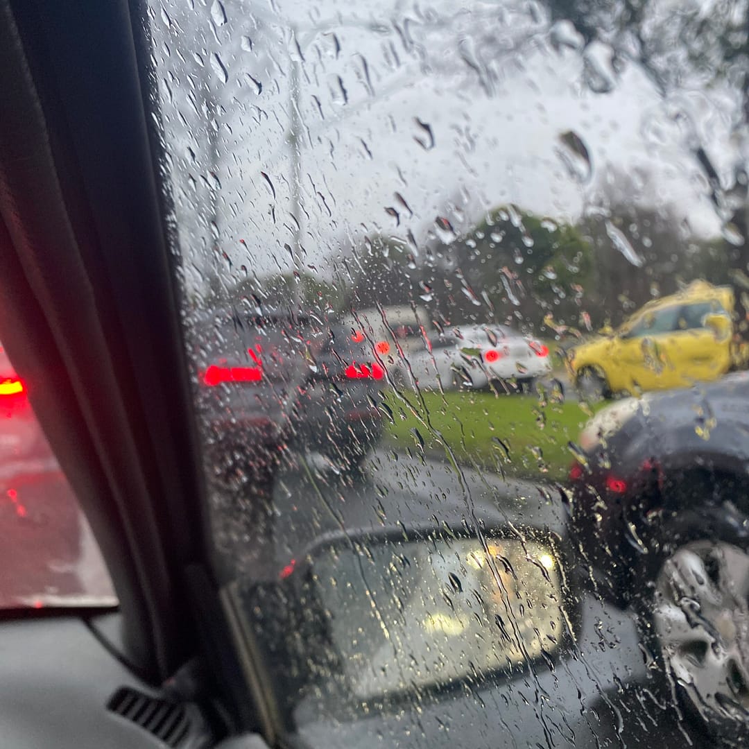 cars outside my car window in the rain