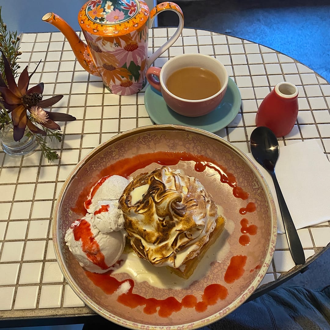 lemon bread and butter pudding with pot of earl grey tea at Twisted Dessert Bar