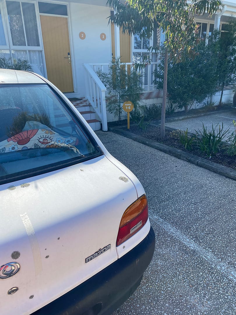 back view of mildred the mazda in front of some steps in anglesea