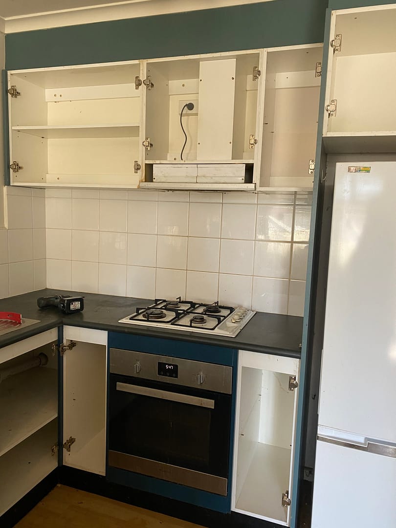 kitchen cabinetry with doors removed